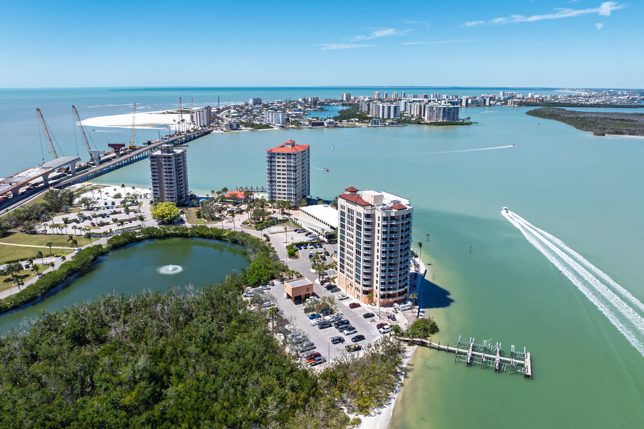 Drone angle view of resorts on Lovers Key in Fort Myers, Florida, with Estero Island in the background.
